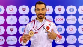 Milli sporcu Ferhat Arıcan'dan paralel barda bronz madalya