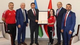 Azerbaycan Cumhurbaşkanı Aliyev'den milli halterci Cansu Bektaş'a özel madalya